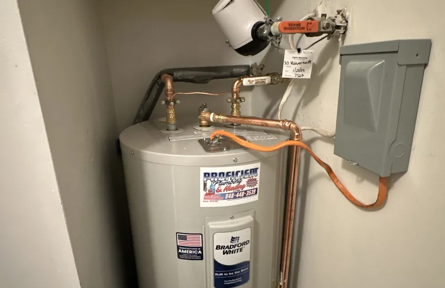 Newly installed water heater, Proficient Plumbing branded