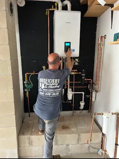 Technician commissioning a tankless water heater